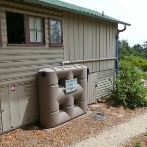 Home Demonstration Garden Renovation, rainwater collection system on west side of Cottage