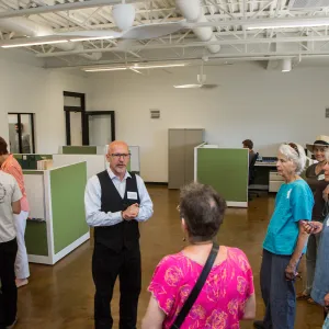 Pritzlaff Conservation Center Ribbon Cutting Celebration, Steve Windhyager leading tour in research workstation area