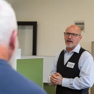 Pritzlaff Conservation Center Ribbon Cutting Celebration, Steve Windhyager leading tour in research workstation area