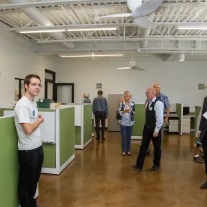 Pritzlaff Conservation Center Ribbon Cutting Celebration, Steve Windhyager leading tour in research workstation area