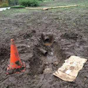 Clogged drain flooding in lower meadow