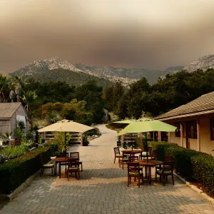 Courtyard in smoke-filtered light from Rey Fire