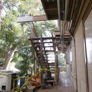 Library structural repair work, east side deck and stairs