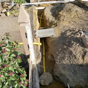 Courtyard renovation, rerouting piping, north edge looking east