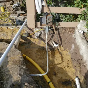 Courtyard renovation, rerouting piping, northest corner