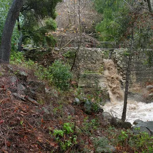 Misson Dam waterfall during rainstorm