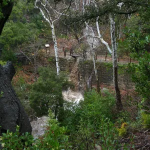 Misson Dam waterfall during rainstorm