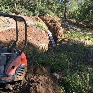 Power and data conduit being installed in the Arroyo Section