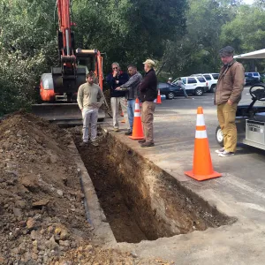 Utility trench at south end of main parking lot for power and data conduit to be installed in the Arroyo Section