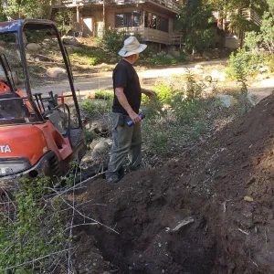 Power and data conduit being installed in the Arroyo Section