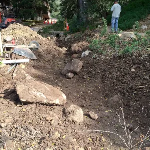 Power and data conduit being installed in the Arroyo Section