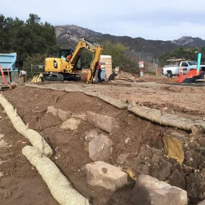 Reconstruction of wall west side of Pritzlaff Conservation Center