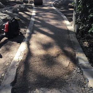 Installing new Eco-Pave path to Cottage and Water Wise Home Garden