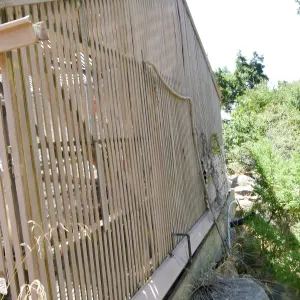 Garden Growers Lath House before start of repairs. Looking south across west wall exterior.