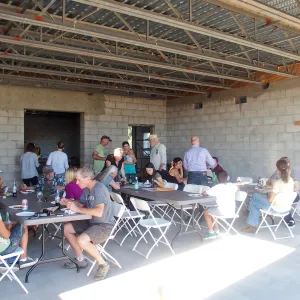 SBBG staff pizza party in future Pritzlaff Conservation Center exhibit space