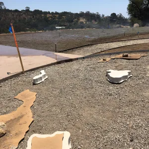 Placing stones in island sculpture