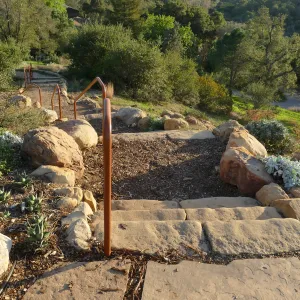 New railing at Island View Garden south steps, view from top