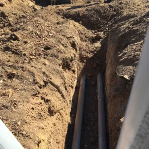 Putting in new electrical line to Horticulture Head House