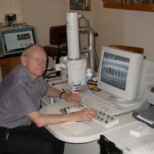 Sherwin Carlson at work with the scanning electron microscope
