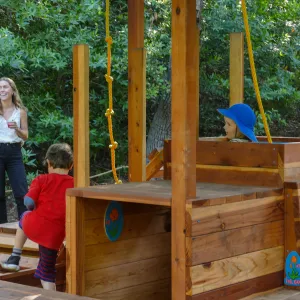 Santa Barbara Botanic Garden Casitas Opening, children playing in â€œCali-Popâ€ Casita
