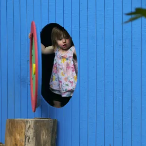 Santa Barbara Botanic Garden Casitas Opening, child playing in the â€œHalfling Houseâ€ Casita