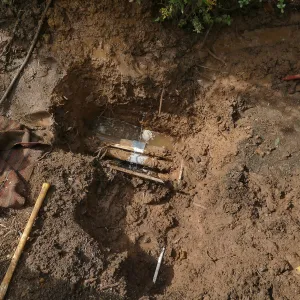 Broken 4 inch irrigation water pipe in Porter Trail section, taken from east side of hole.
