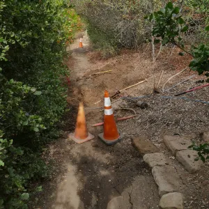 Site of broken 4 inch irrigation water pipe in Porter Trail section, looking north.