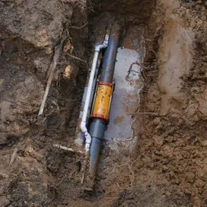 Repair of broken 4 inch irrigation water pipe in Porter Trail section