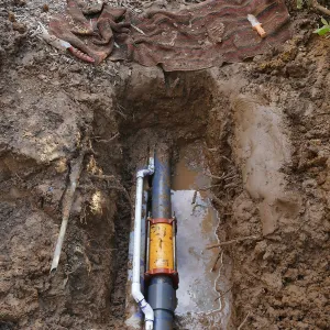 Repair of broken 4 inch irrigation water pipe in Porter Trail section