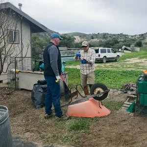 Richard Powell, Dennis Houghton, Repairing wheelbarrow, NPS Nursery