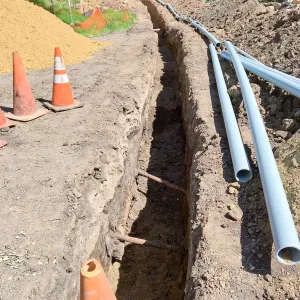 Trenching at Hansen site for communications and electrical lines