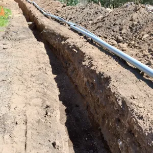 Trenching at Hansen site for communications and electrical lines