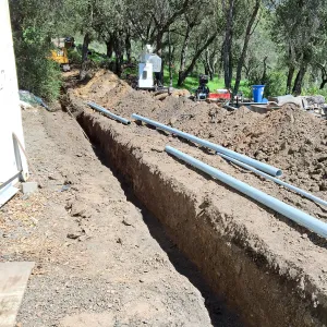 Trenching at Hansen site for communications and electrical lines
