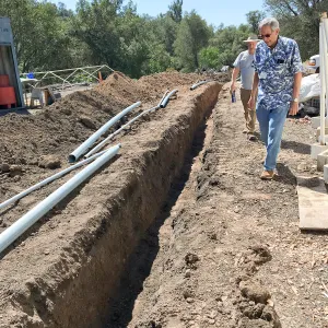 Trenching at Hansen site for communications and electrical lines