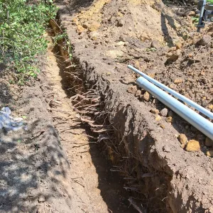 Trenching at Hansen site for communications and electrical lines