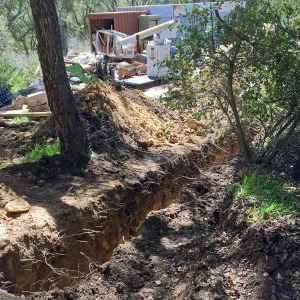 Trenching at Hansen site for communications and electrical lines