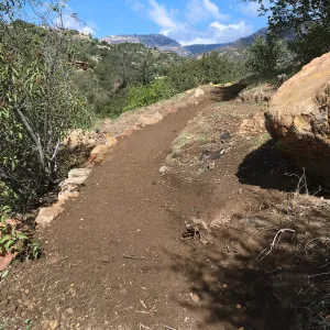 Building new trail on west slope of PCC ridge for new Island Section