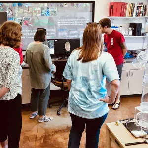 Sean Carson demonstrating in the Multipurpose Lab, Behind the Scenes Pritzlaff Conservation Center Members Only Tour