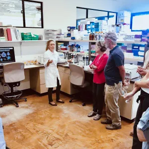 Kristen Lehman demonstrating in the Genetics Lab, Behind the Scenes Pritzlaff Conservation Center Members Only Tour