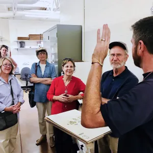 Matt Guilliams demonstrating in the herbarium, Behind the Scenes Pritzlaff Conservation Center Members Only Tour