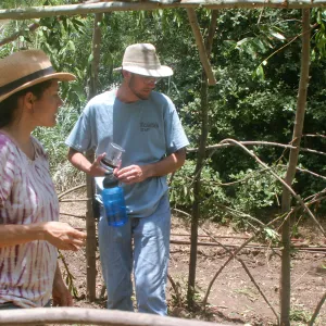 Betsy Lape and Charlie Adams working on the Woodrat House Casita