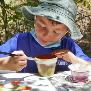 Acorn Adventurers Summer Camp, flower pot decorating activity