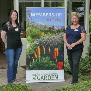 Rita Boss and Stacy Bloodworth with a new membership display banner