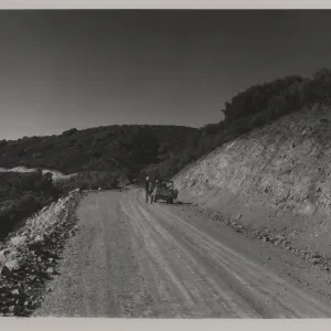 Sierra Madre Road soon after construction, jeep with field researchers