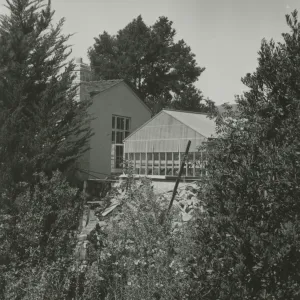 new Blaksley Library building with old greenhouse in front