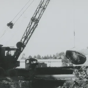 North Wing construction, crane moving boulders