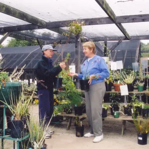 Mary Shehan with visitor in nursery