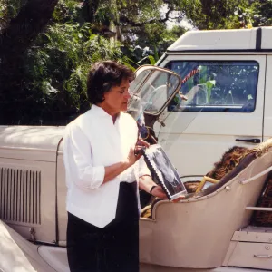 Sydney Baumgartner with picture of Elizabeth de Forest, car is Lockwood de Forest's â€˜Buffalo'