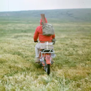 George Kritzman on motorcycle, San Miguel Island