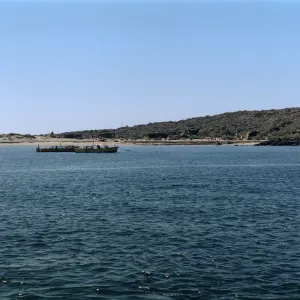boats anchored in San Martin Island cove